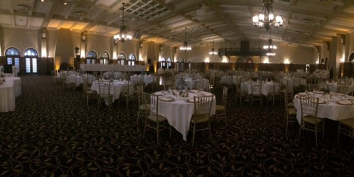 Main Lounge at the IMU. Table settings by IMU, Gold Chargers by Soiree, Table Numbers and Thank you Cards by Zephyr Weddings, and Centerpieces by Racehorse Royalty, Chivari Chairs by AeroRental