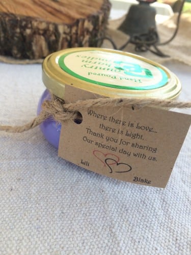 Lili & Blake's wedding favor was a candle with a tag that said "Where there is love, there is light. Thank you for sharing our special day with us!" 