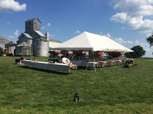 The tent was set up to host guests for dinner between the ceremony and the dance. The weather was perfect, so the double sided buffet was placed outside the tent. 