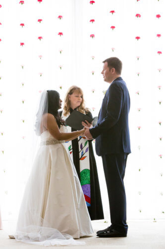 couple and officiant