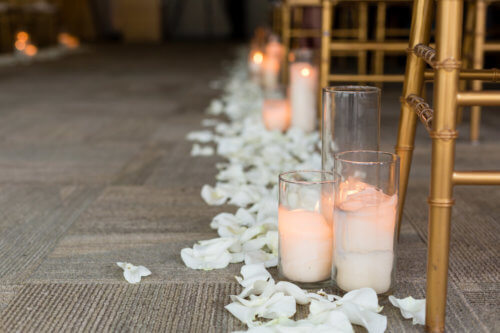 Candles and petals down the aisle