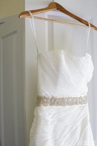 Dress on hanger. Photo credit: The Modern Lovebird