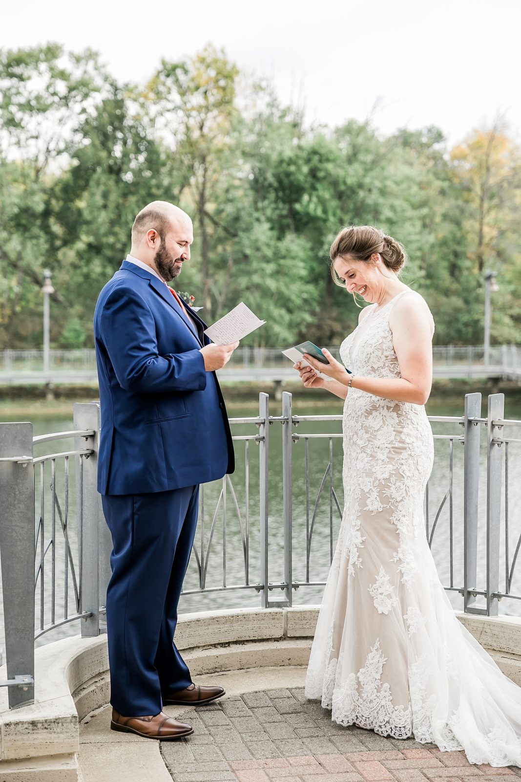 bride and groom read letters from each other