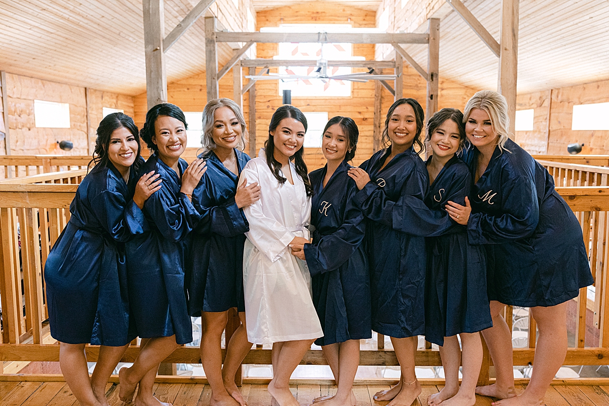 bridesmaids in blue silk robes