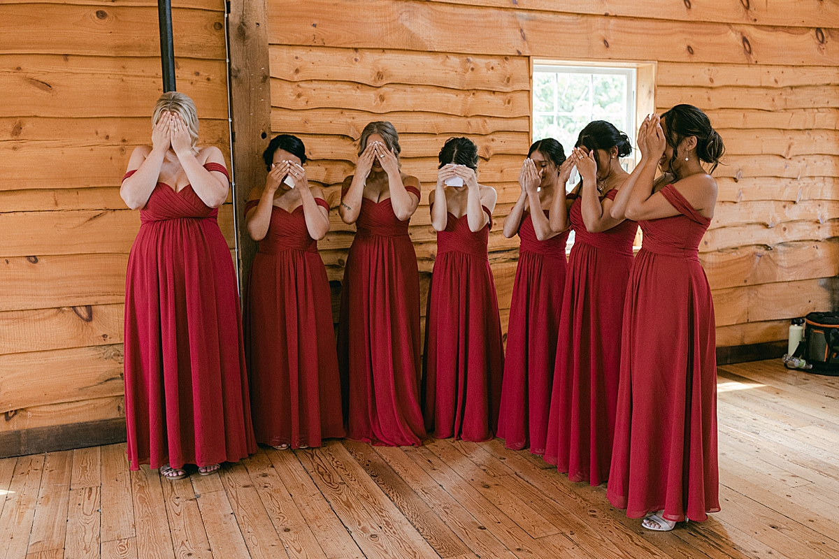 bridesmaids first look covering eyes