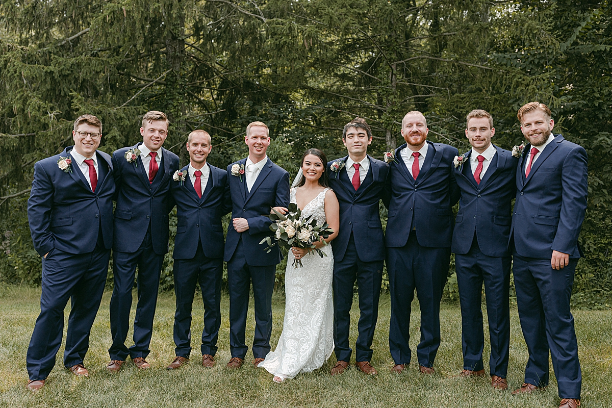bride with groomsmen