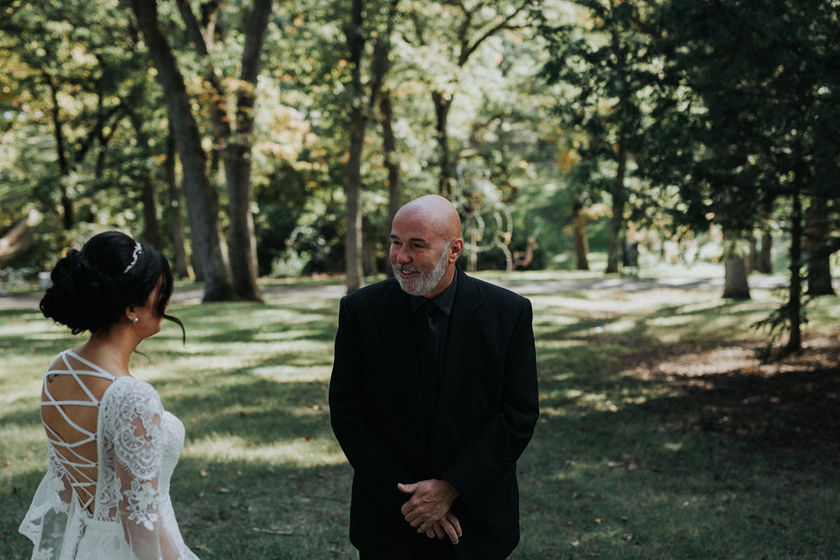 father seeing his daughter in her wedding dress for the first time