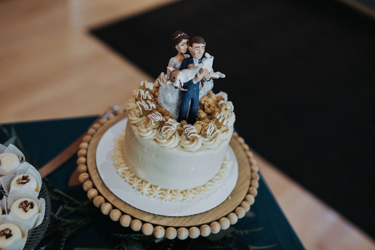 custom wedding cake topper with couple and corgi