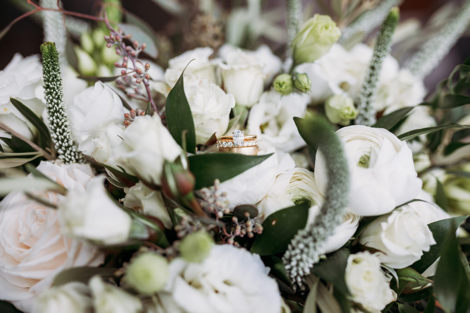 white wedding bouquet with rings