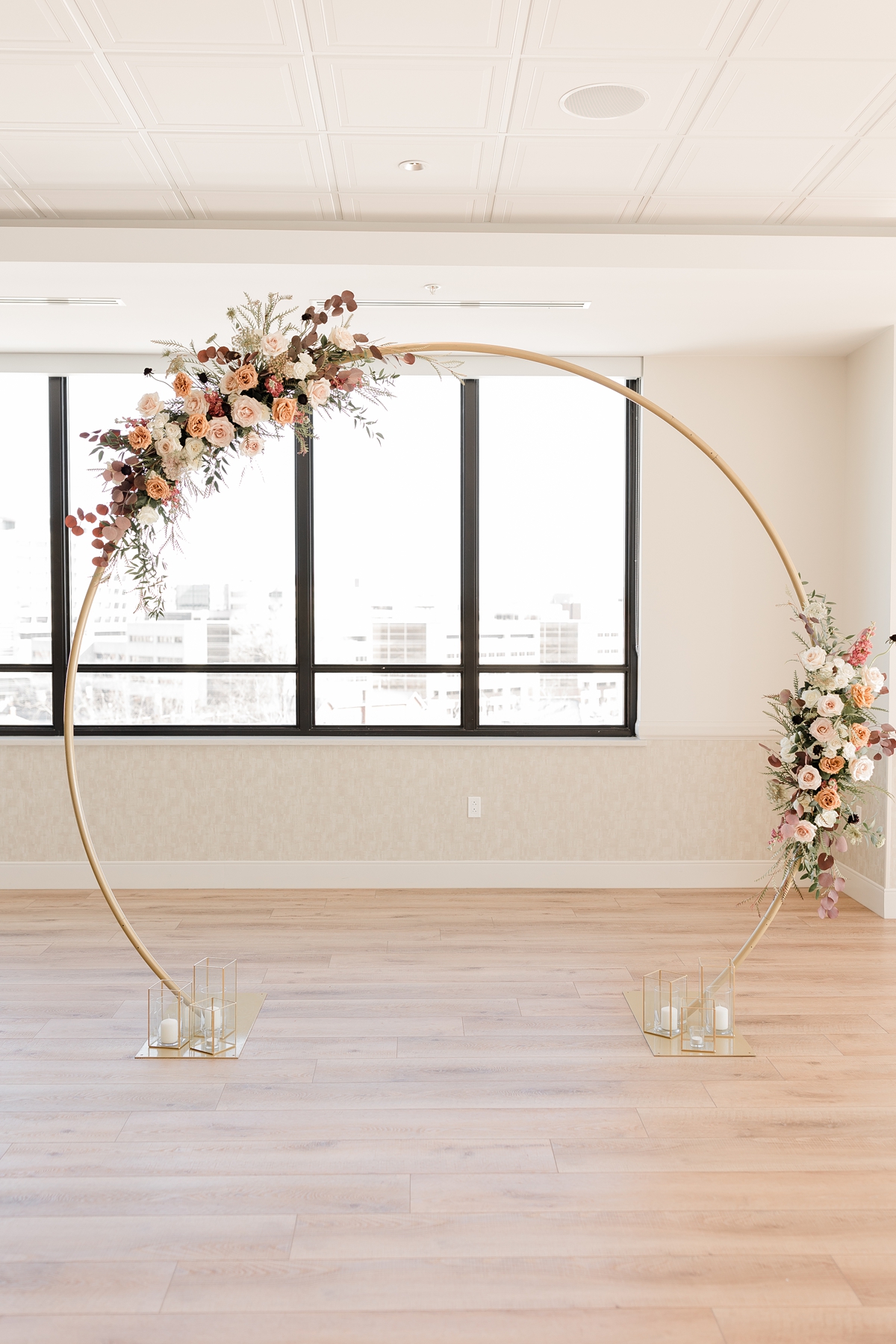 Gold and rose wedding ceremony arch