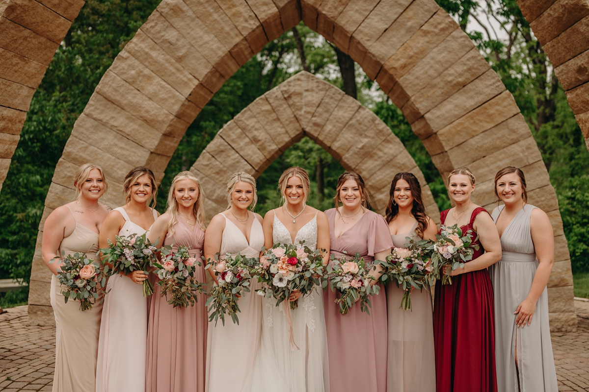 pink and red bridesmaids dresses at Celebration Farm Wedding Iowa City