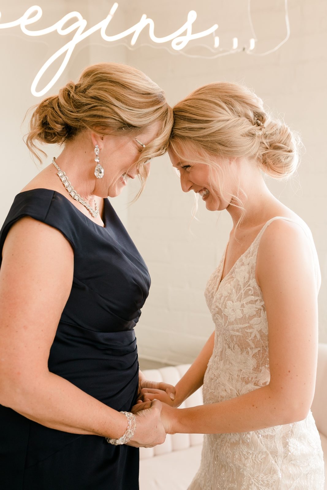 Cedar Rapids Iowa Blush Pink Harmac Wedding bride and mother embrace