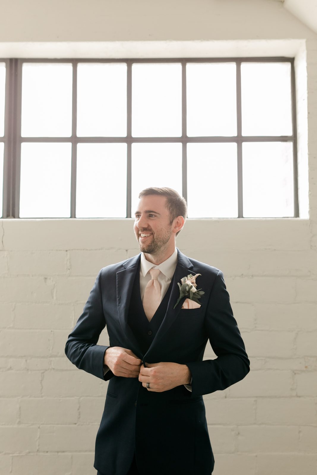 Cedar Rapids Iowa Blush Pink Harmac Wedding groom portait