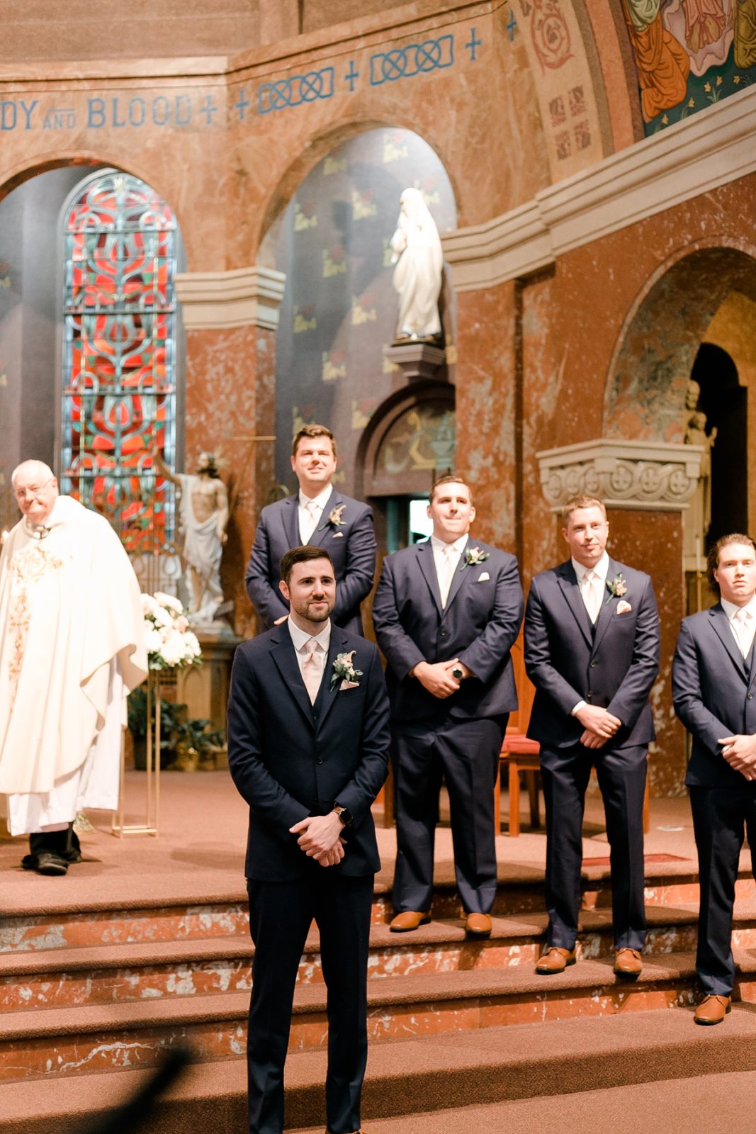 St Patricks Catholic Church In Cedar Rapids Wedding groom watching bride walk down aisle