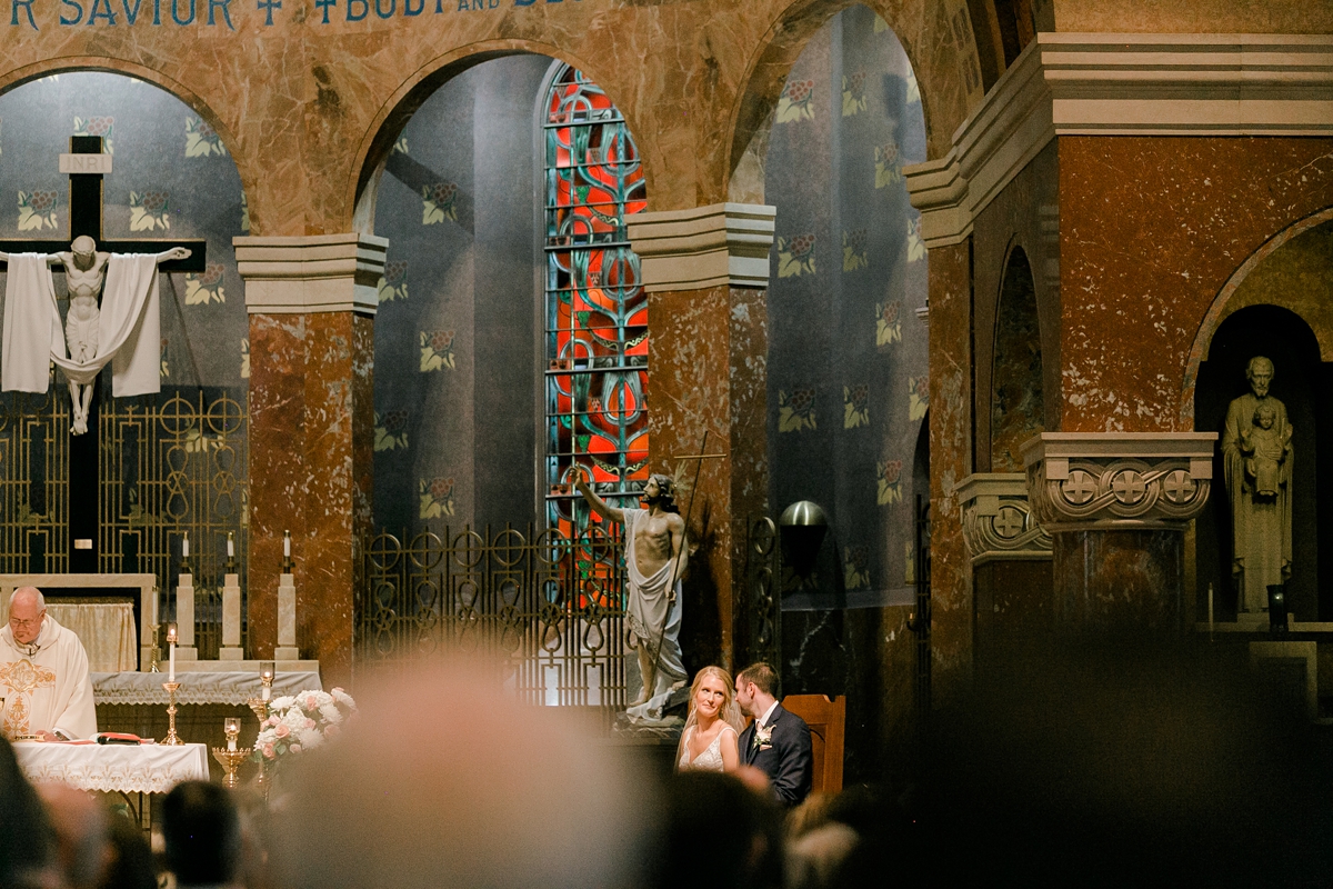 St Patricks Catholic Church In Cedar Rapids Wedding bride and groom sitting