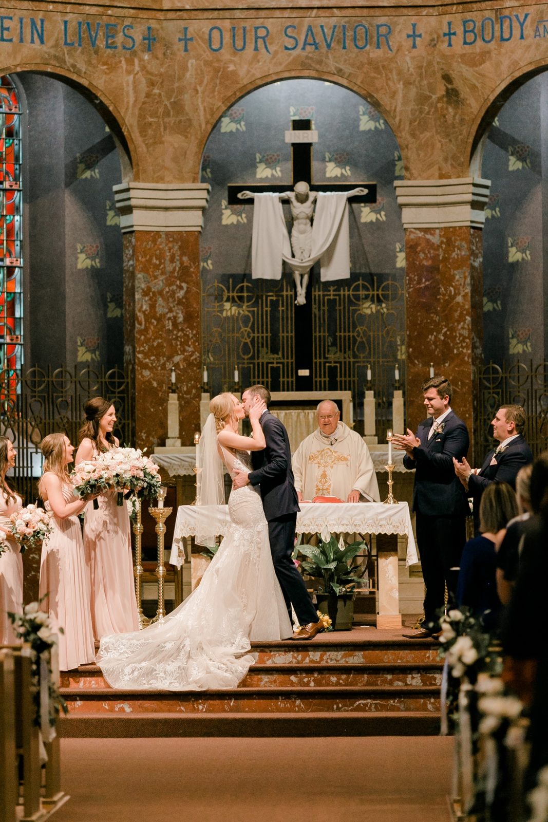 St Patricks Catholic Church In Cedar Rapids Wedding bride and groom kiss