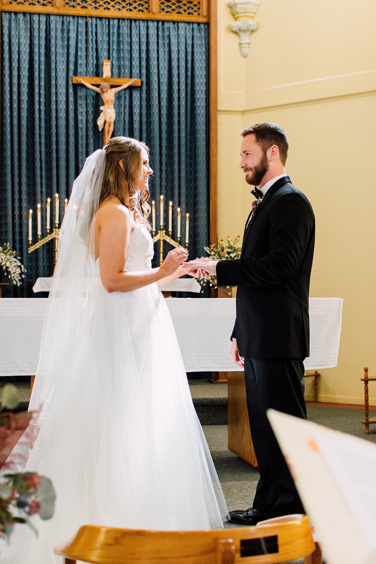 St Peter's Catholic Church in Oxford Iowa bride and groom during wedding ceremony