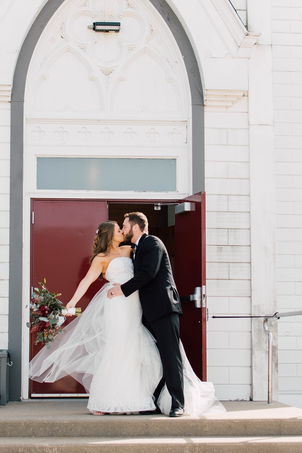 St Peter's Catholic Church in Oxford Iowa bride and groom exiting church