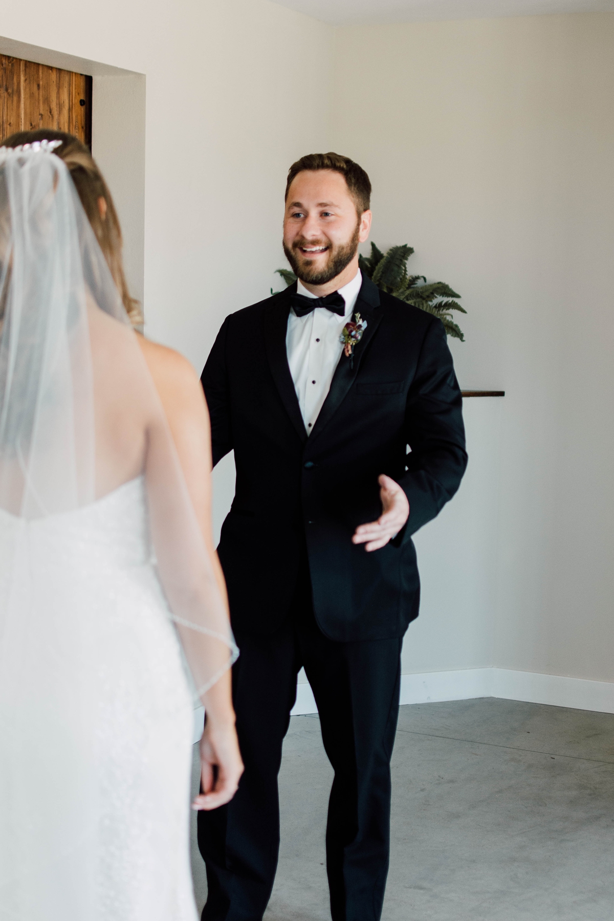 Gathering Barn Williamsburg Iowa Wedding bride and groom first look