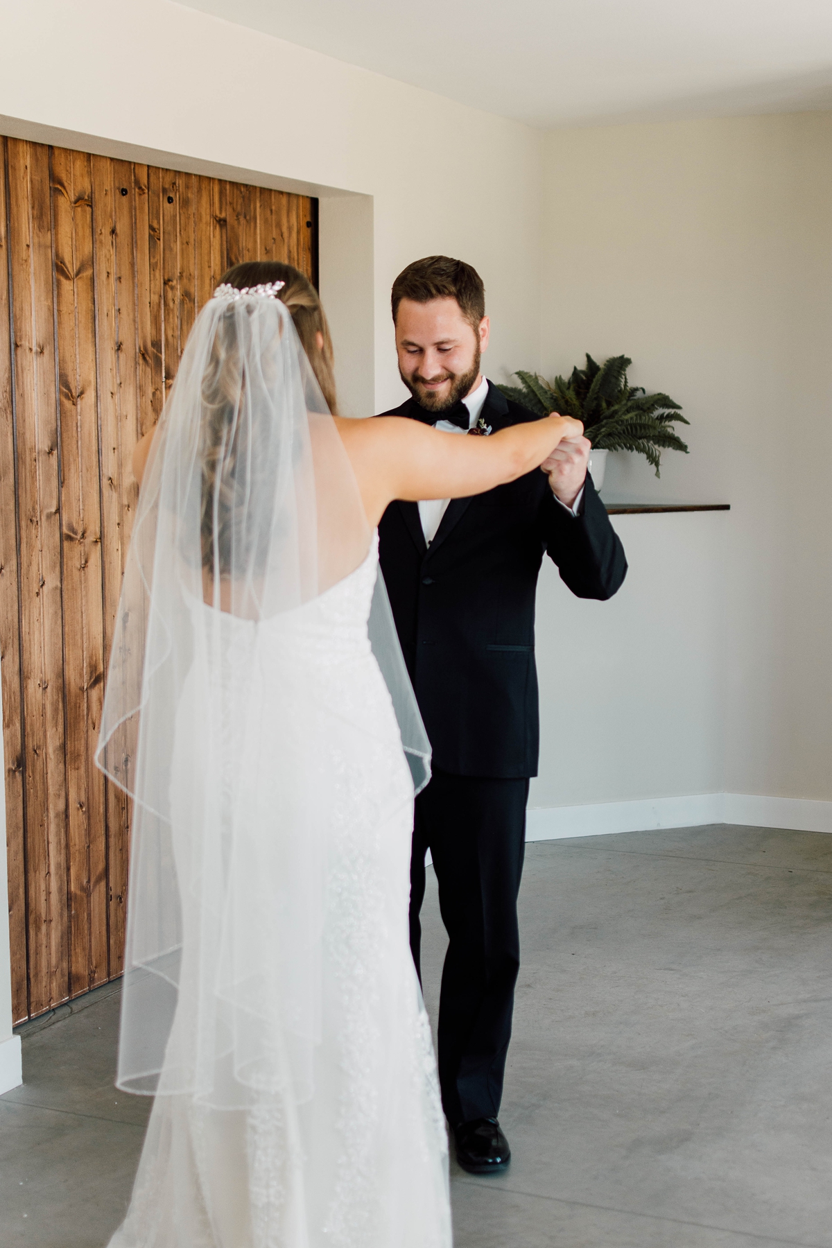 Gathering Barn Williamsburg Iowa Wedding bride and groom first look