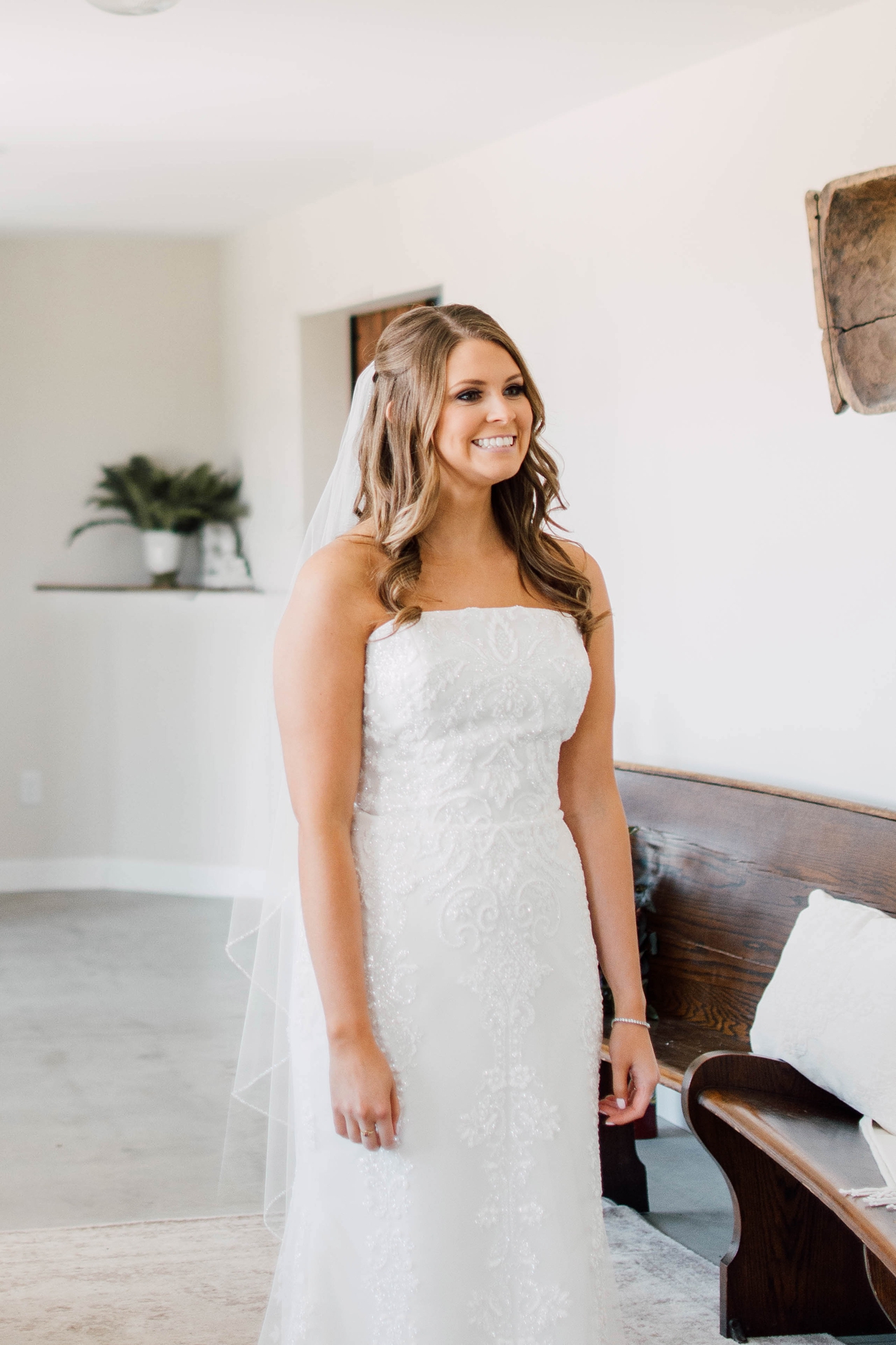 Gathering Barn Williamsburg Iowa Wedding bride smiling at father