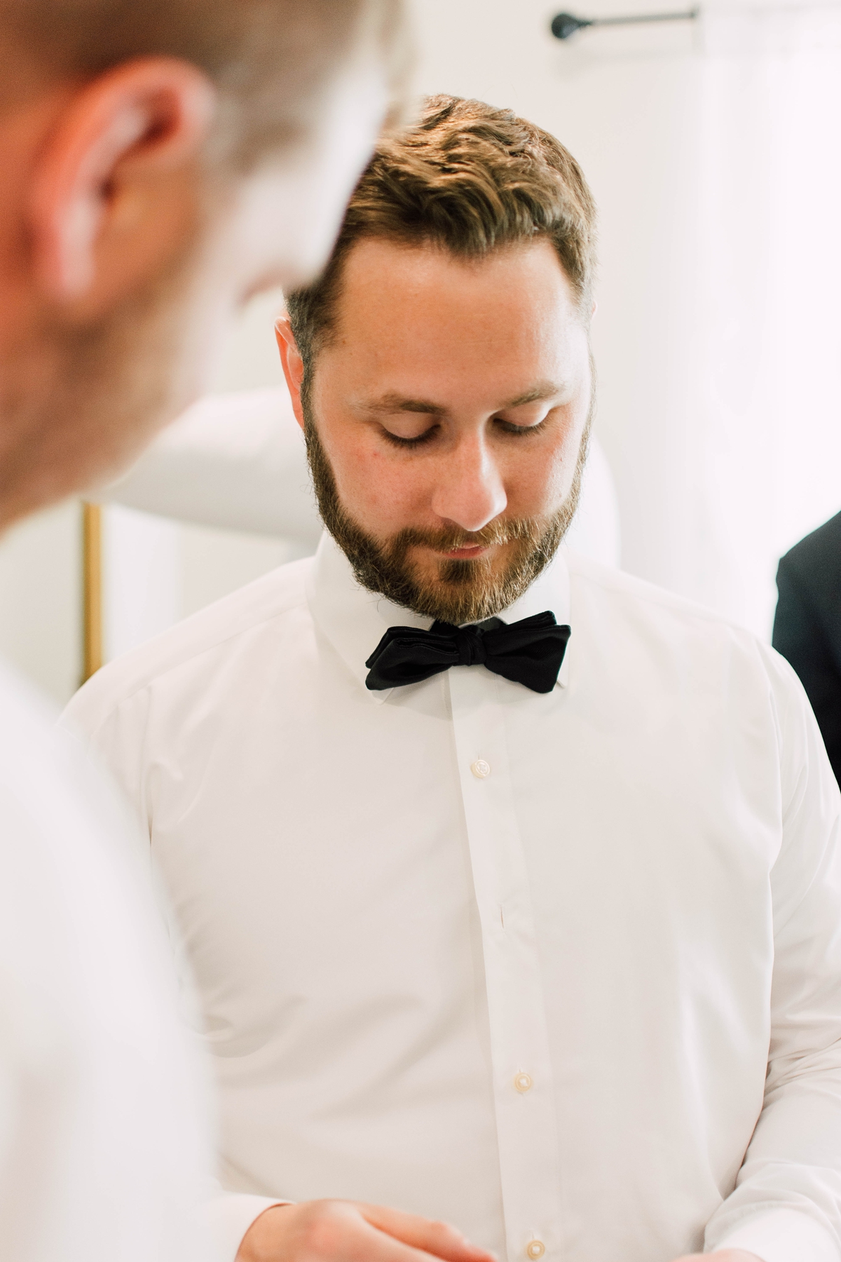 Gathering Barn Williamsburg Iowa Wedding groom getting ready