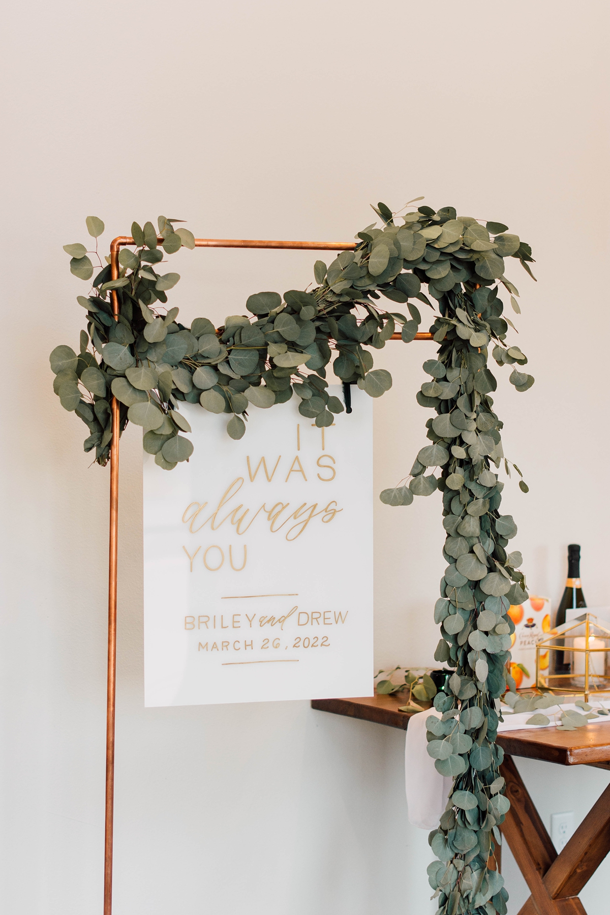 Gathering Barn Williamsburg Iowa Wedding gold and greenery wedding reception sign