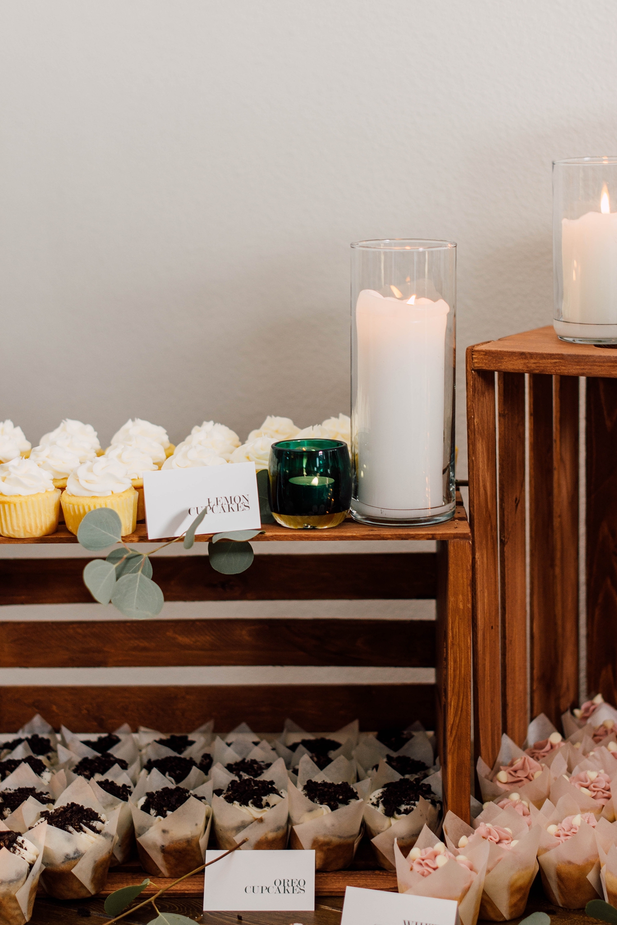 Gathering Barn Williamsburg Iowa Wedding cupcake display table at reception