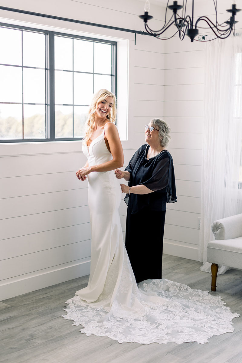 mom and daughter getting ready for wedding