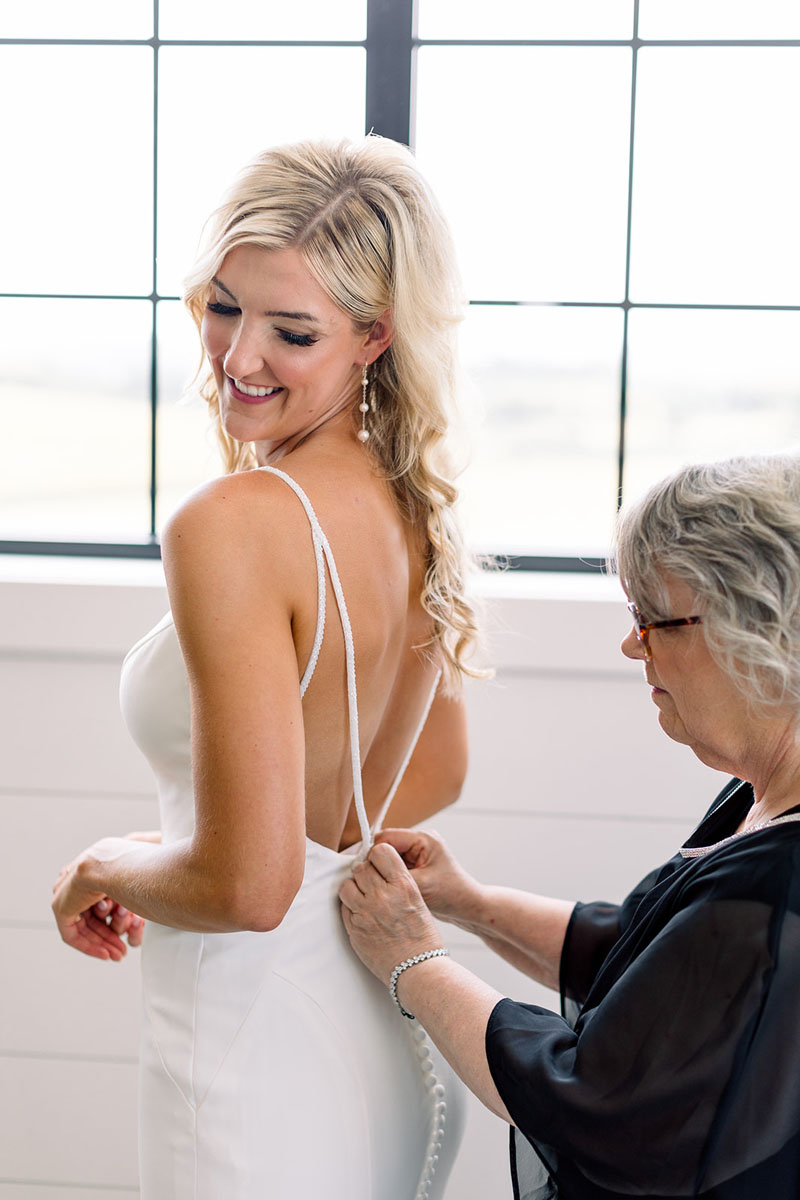 bride getting ready at walker homestead with her mom