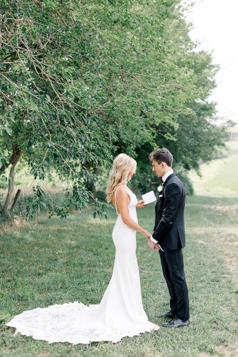 reading vows at Walker Homestead tree