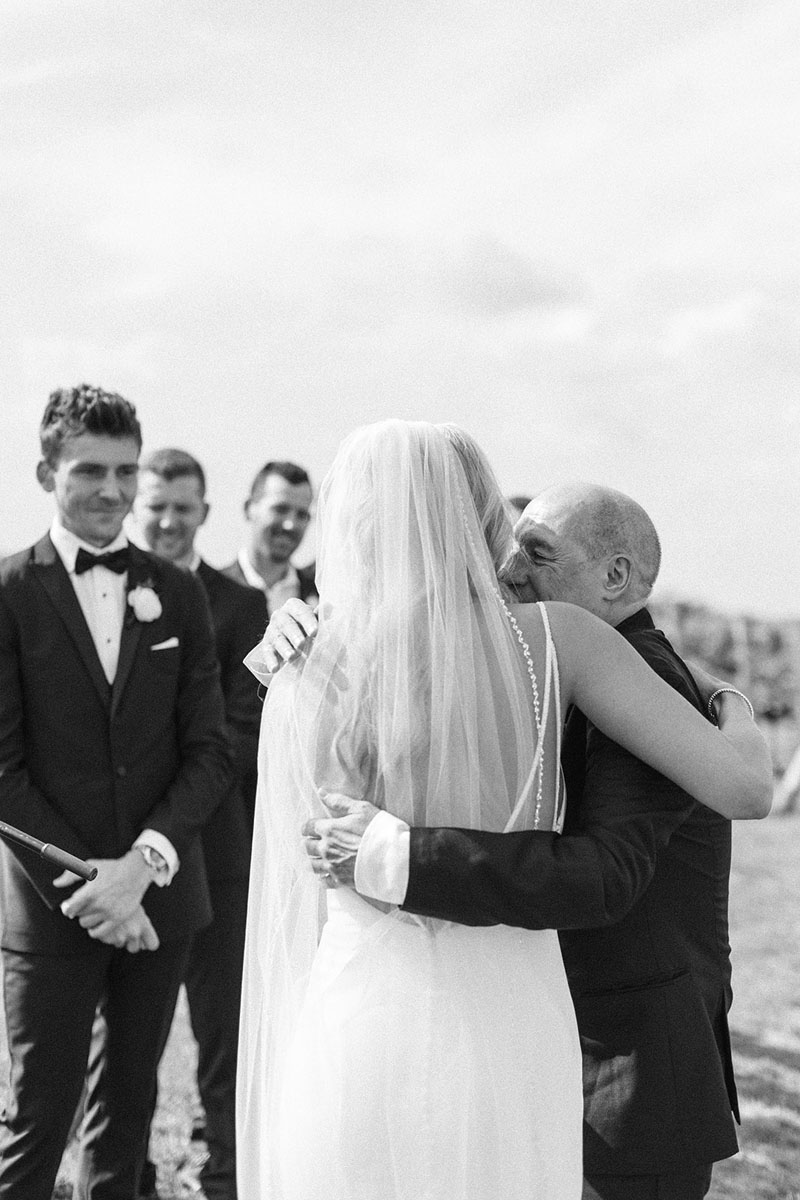 dad hugs bride at walker homestead lora connor