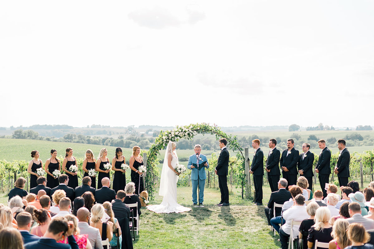walker homestead ceremony white flowers arch