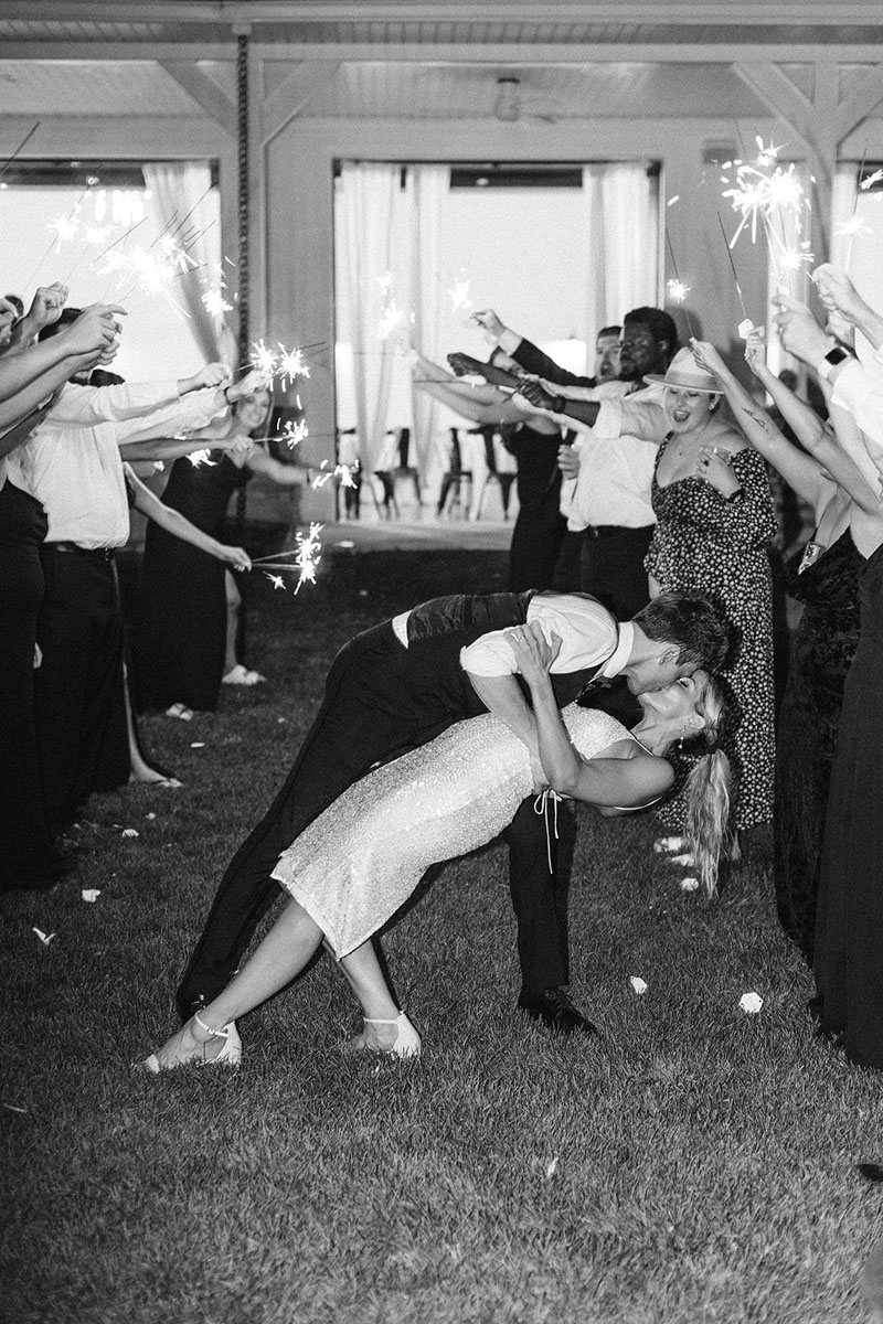 bride groom sparkler exit kissing